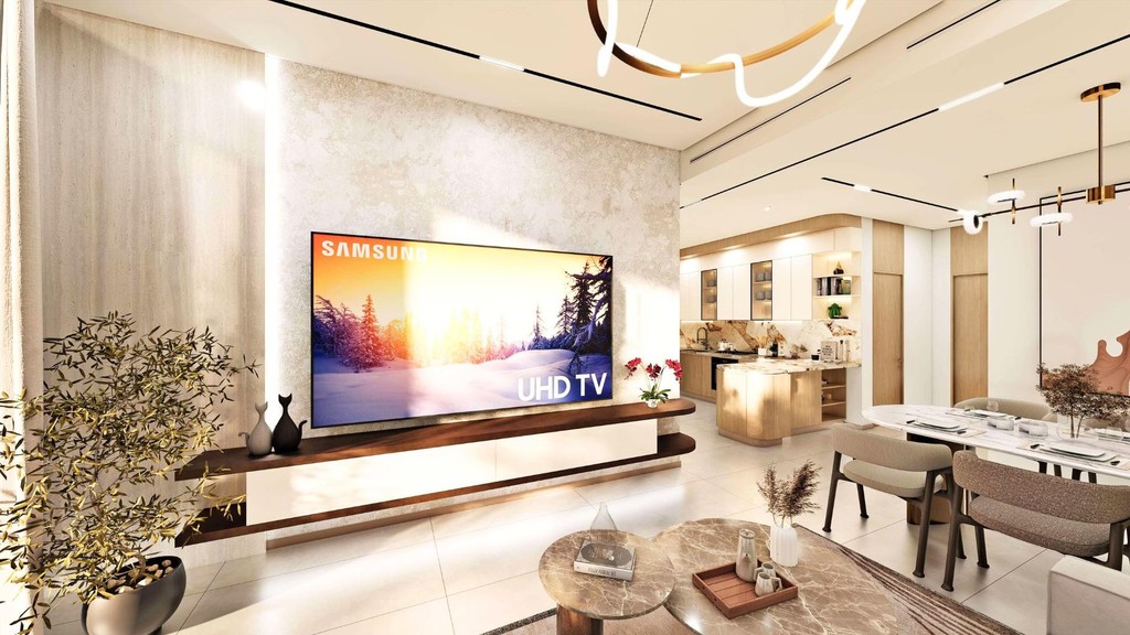 A chic living room featuring a dining table and chairs, representing the contemporary style of Xenia Residences.