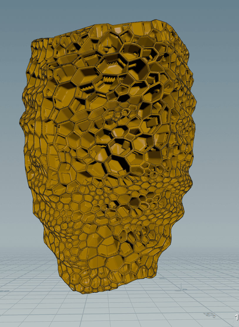 A technical 3D model view displays the intricate geometric mesh and "beehive" structure of the golden head