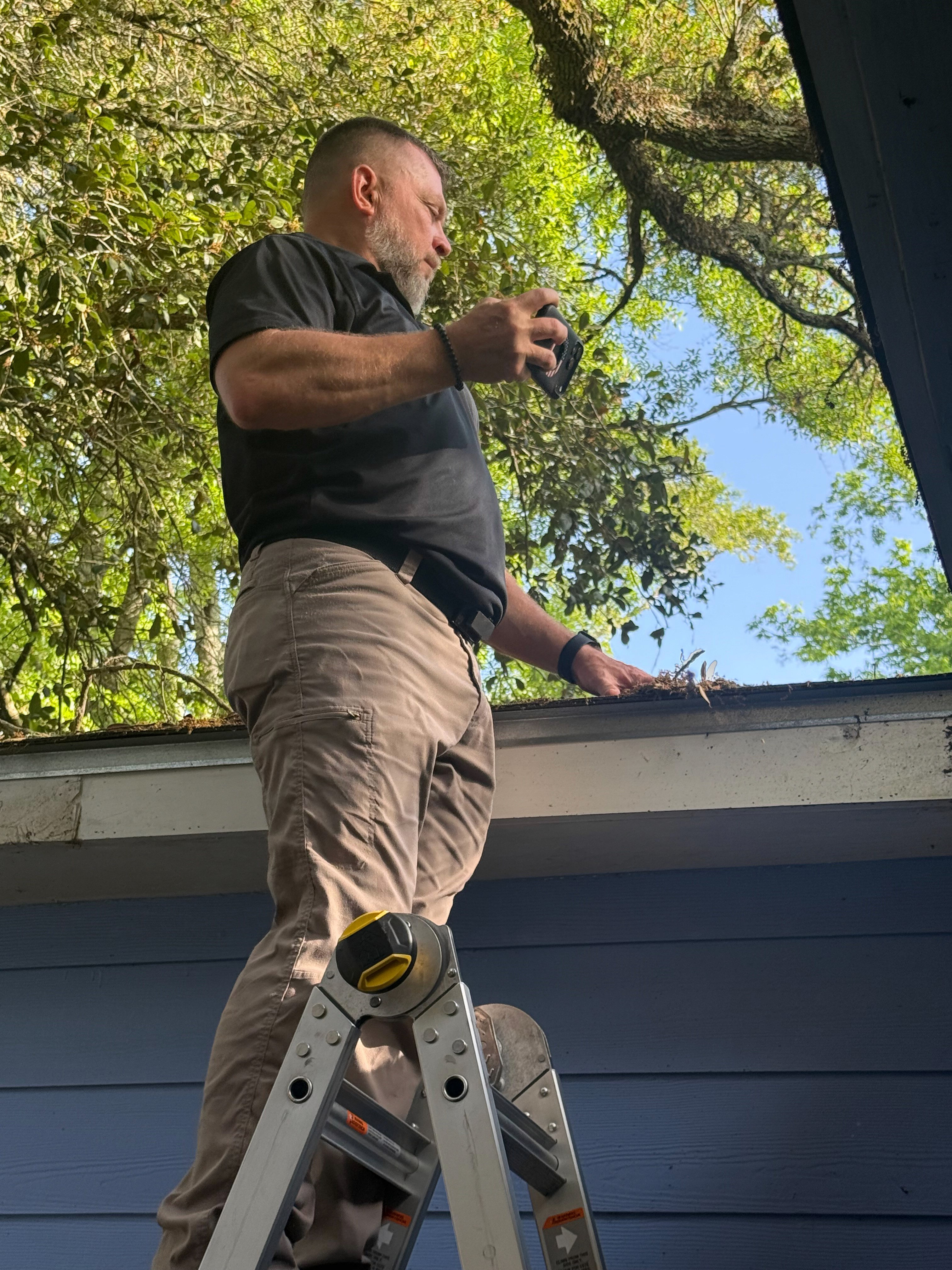 home inspector inspecting house in Pass Christian Mississippi