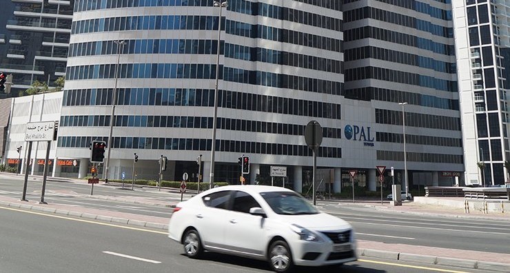 Street level view of Opal Tower showcasing professional office spaces available through our real estate agency.