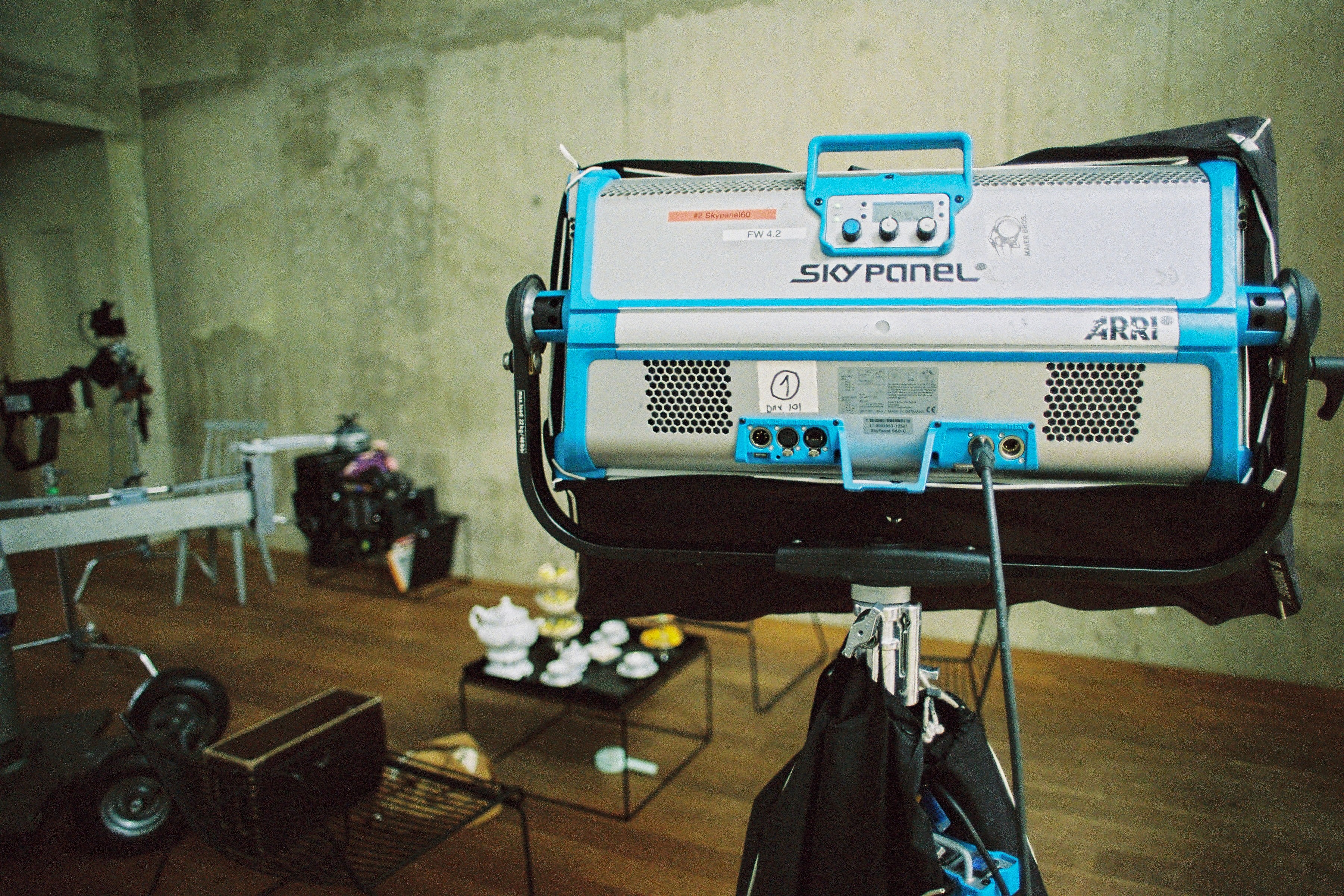 Person in a white off-shoulder top using a MacBook laptop, with text overlay 'What's new in digital?' and the fabrica® logo in the top corner.