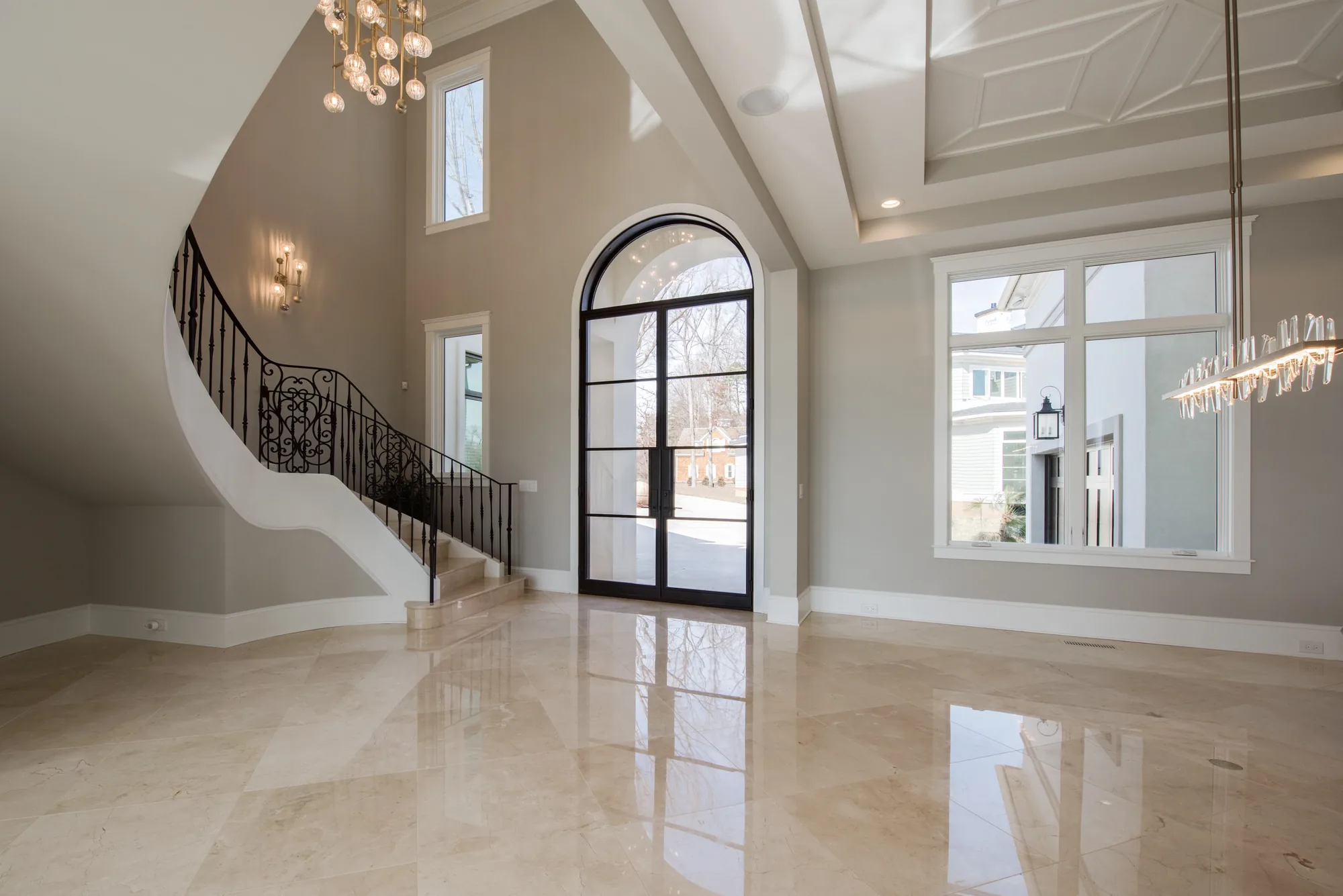Curved staircase and arched steel door