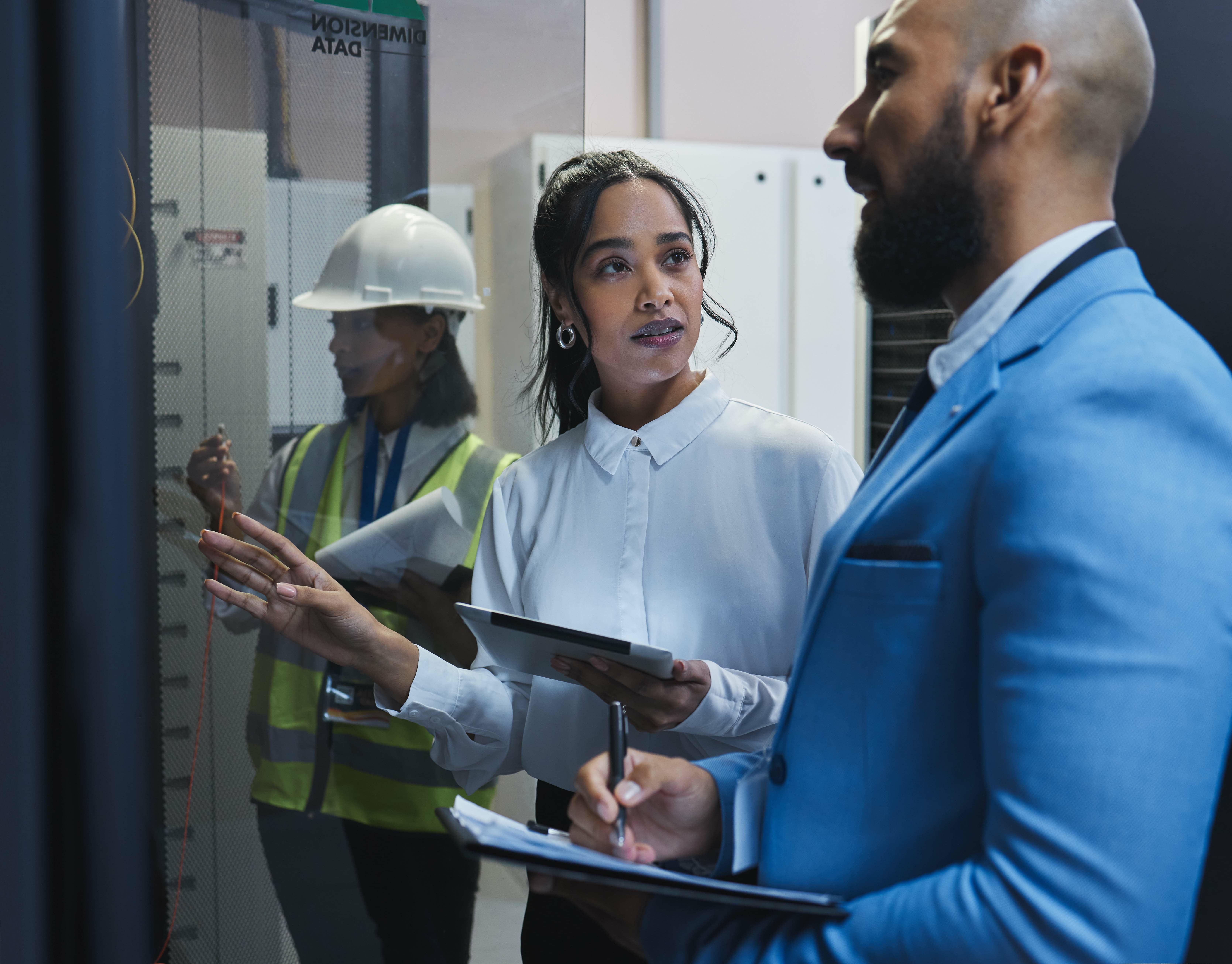 A man and woman cunducting an Energy Audit