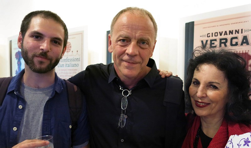 portrait of two men and a woman