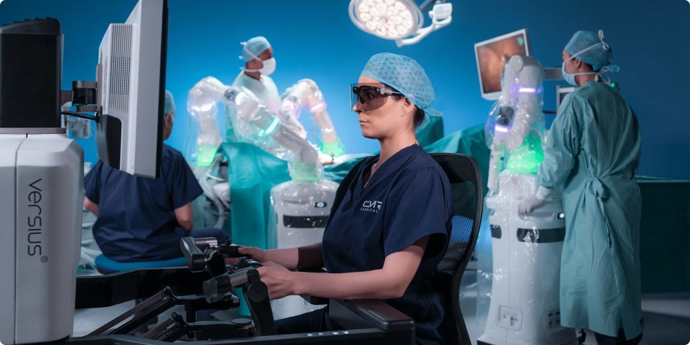 a woman operating a robotic surgical device