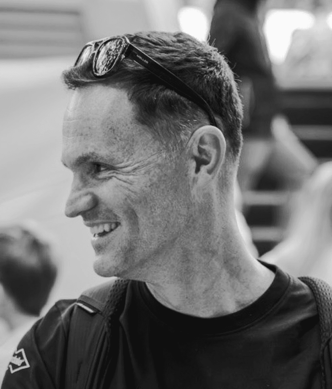 Gavin Brophy smiling with sunglasses on head