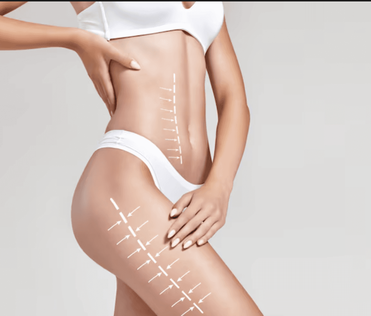 a woman in a blue bikini standing on the beach