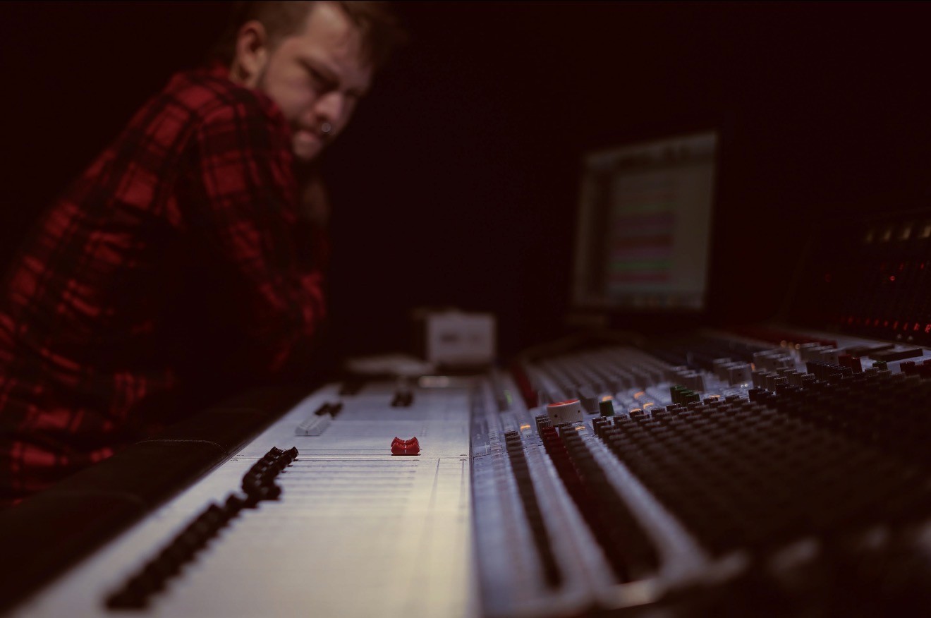 Portrait of Dexter Black, audio engineer, sound designer and musician