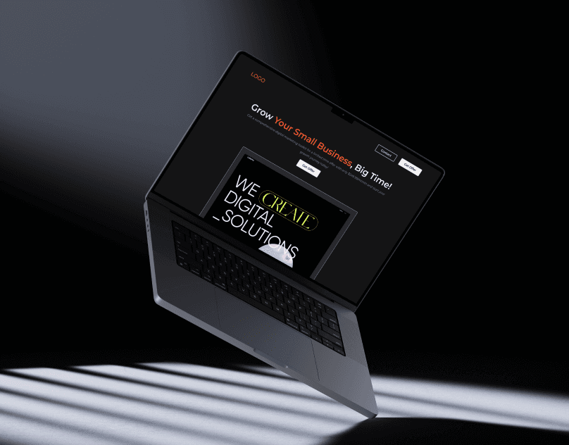 A sleek laptop displaying a website landing page with the text "We Create Digital Solutions," set against a dramatic, shadowy backdrop.