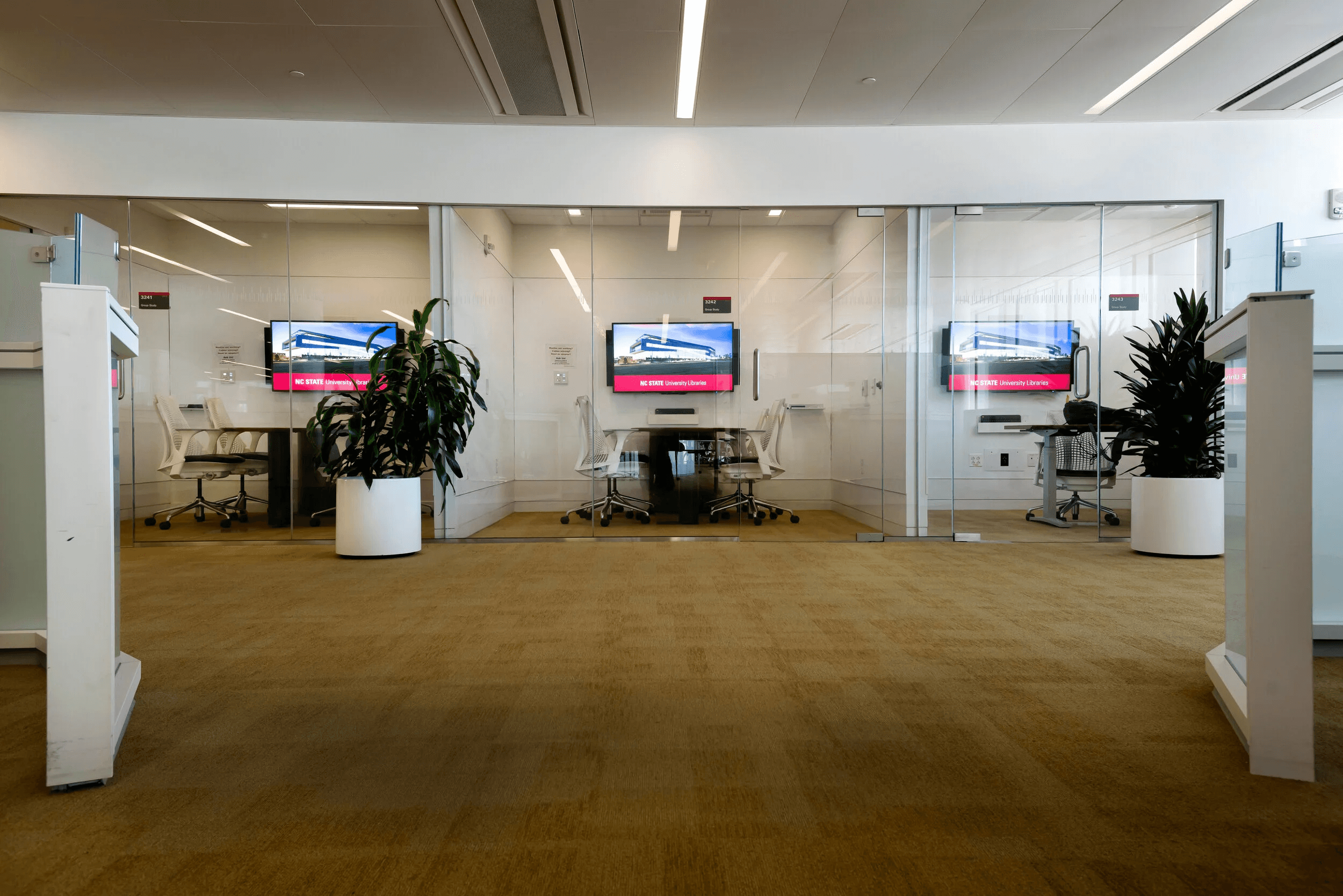 people sitting on chairs watching a game