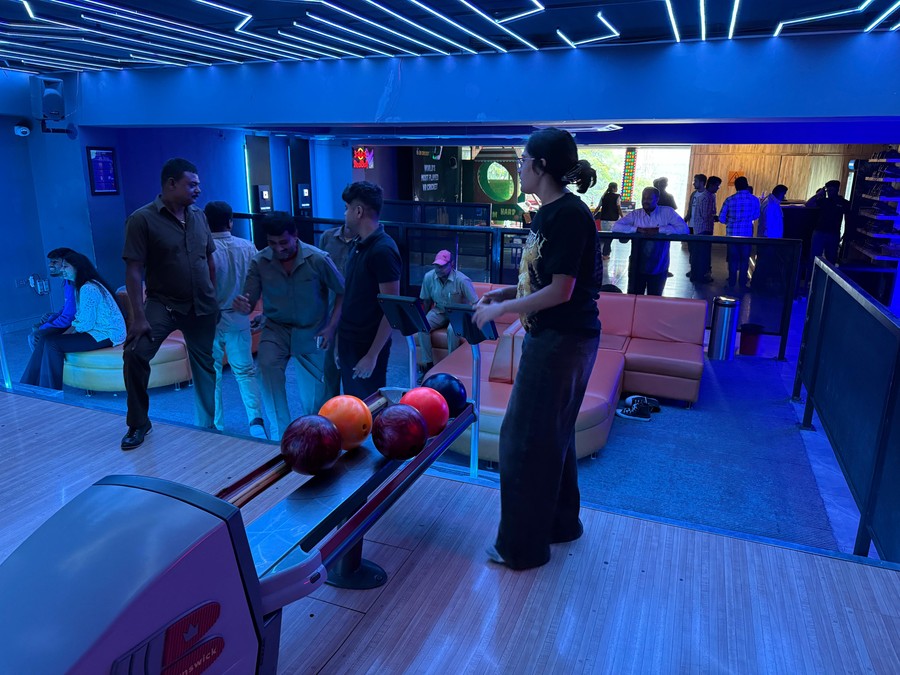 Teaching municipal workers how to bowl for the first time :)