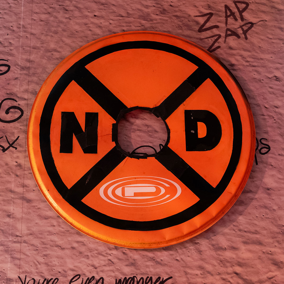 Railroad crossing logo drum head