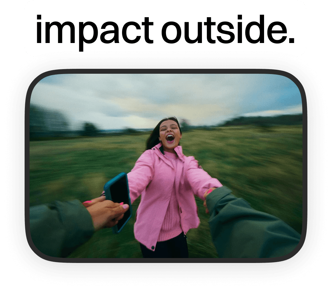 Woman running in an open field — lifestyle brand mood reference