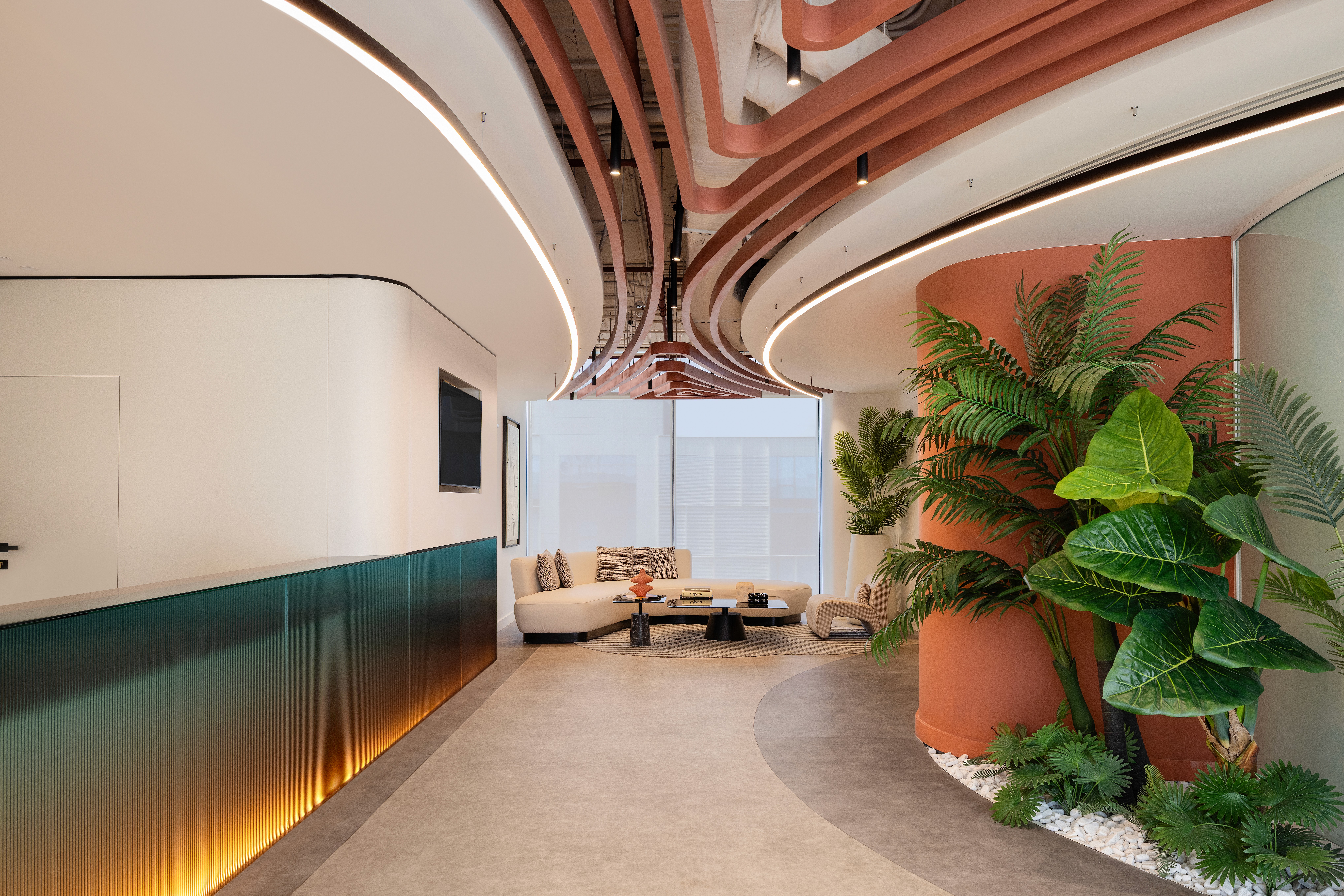 Modern white building with a covered walkway and bicycle.