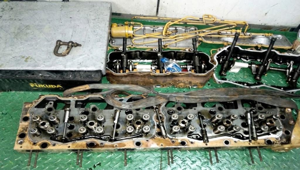 Engine component reassembly and testing.