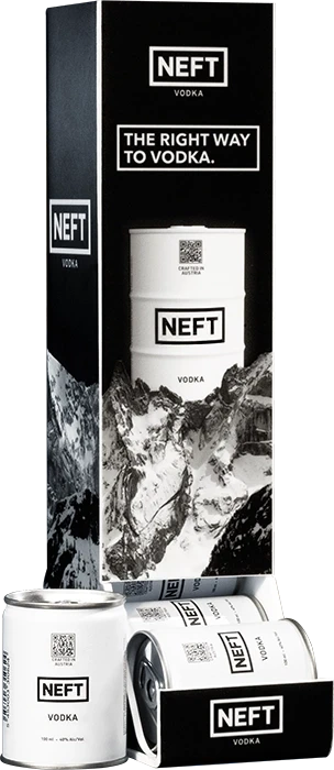 NEFT Mini Barrels displayed in a black and white dispenser.