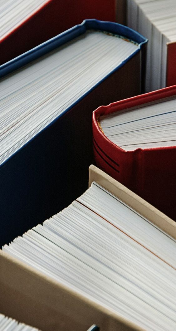 shallow focus photography of books