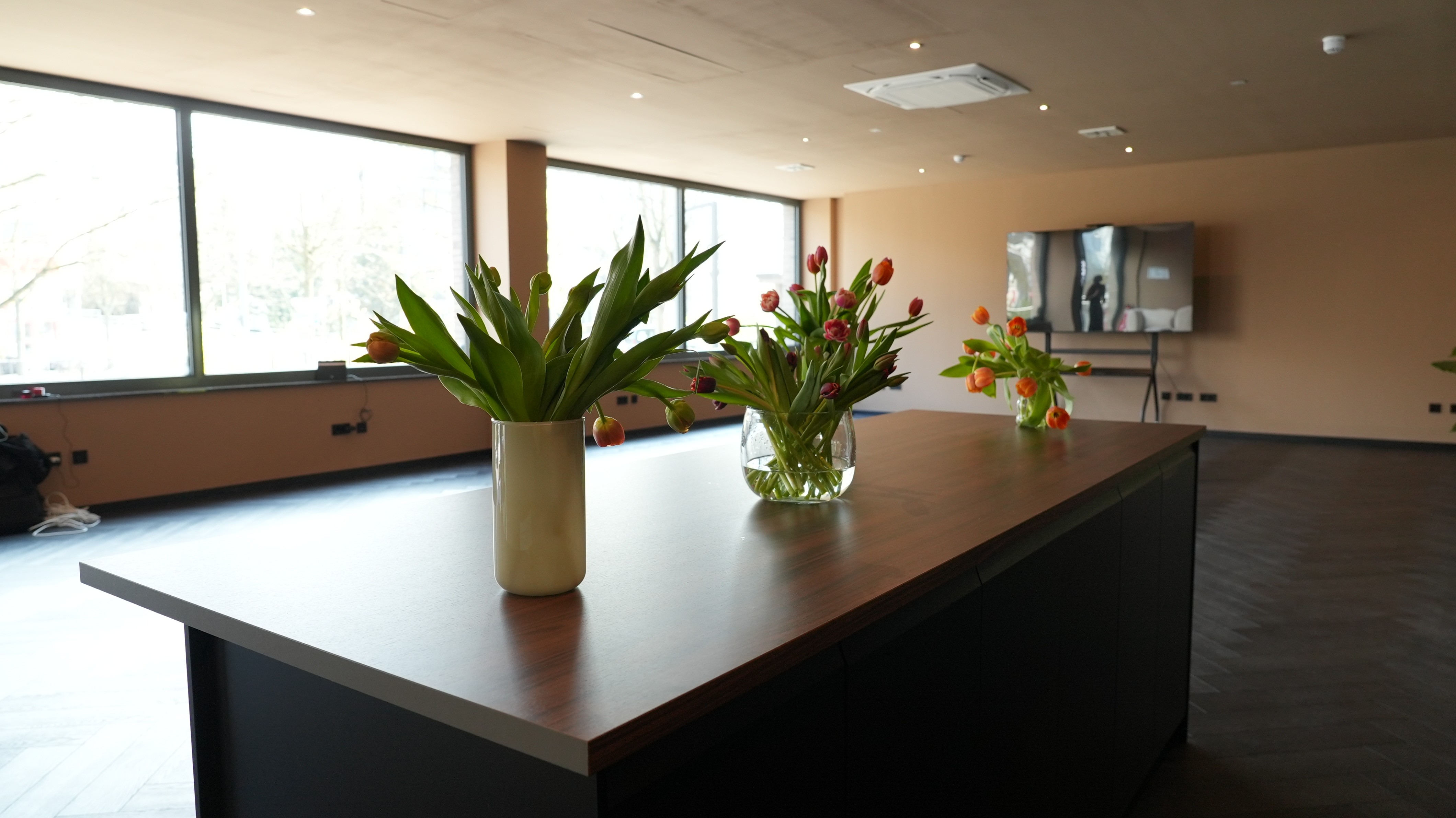 Snow-covered mountain peak emerging from clouds
