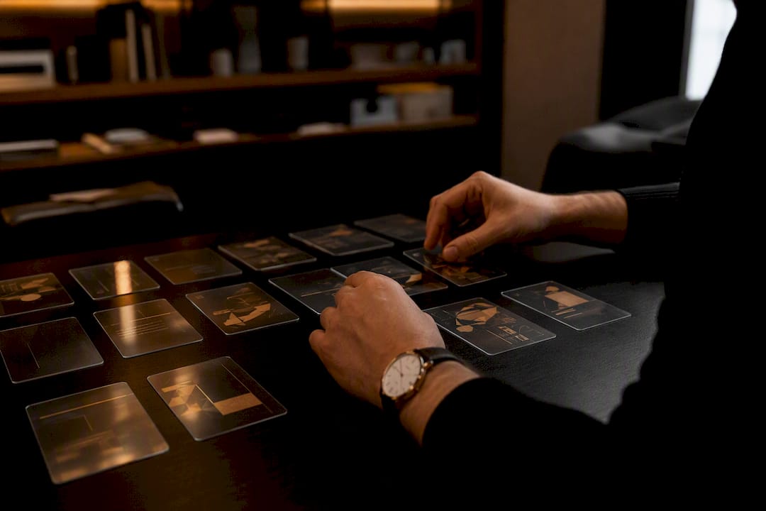 Hands holding marketing campaign code cards