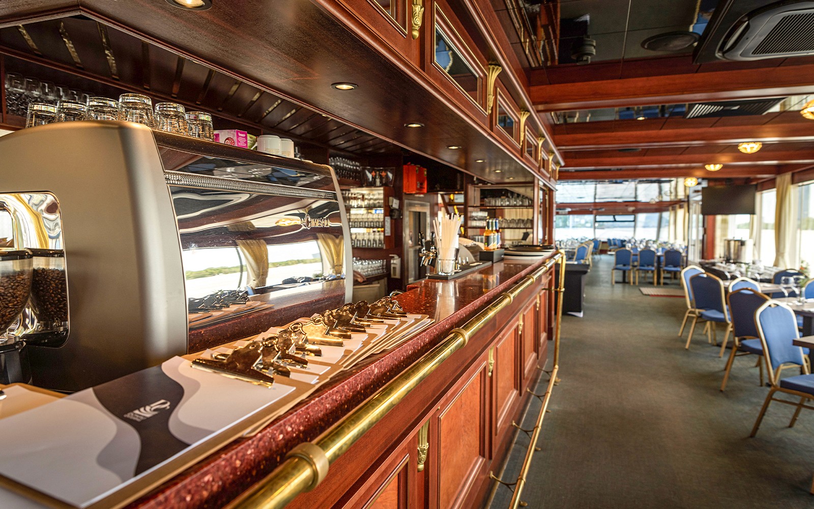 Cruise ship interior with bar and seating area on Dürnstein and Wachau tour from Vienna.