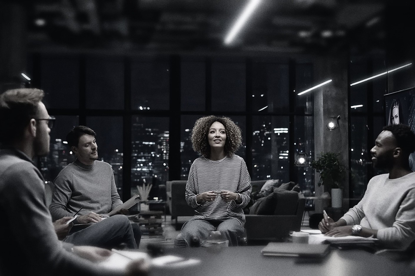 Team working in an office watching at a presentation