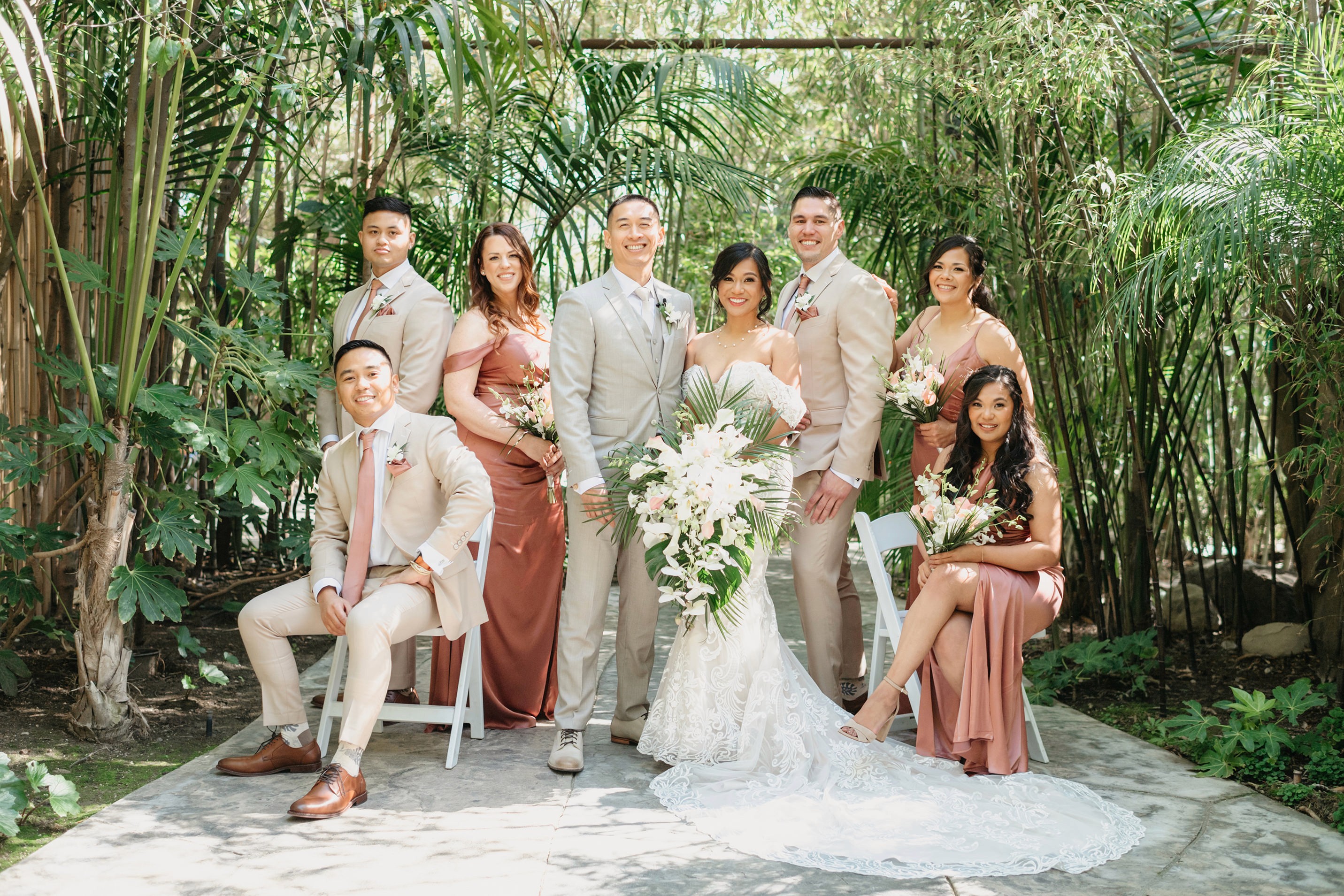 Flat lay wedding details with bouquet, rings, and sparkling bridal heels