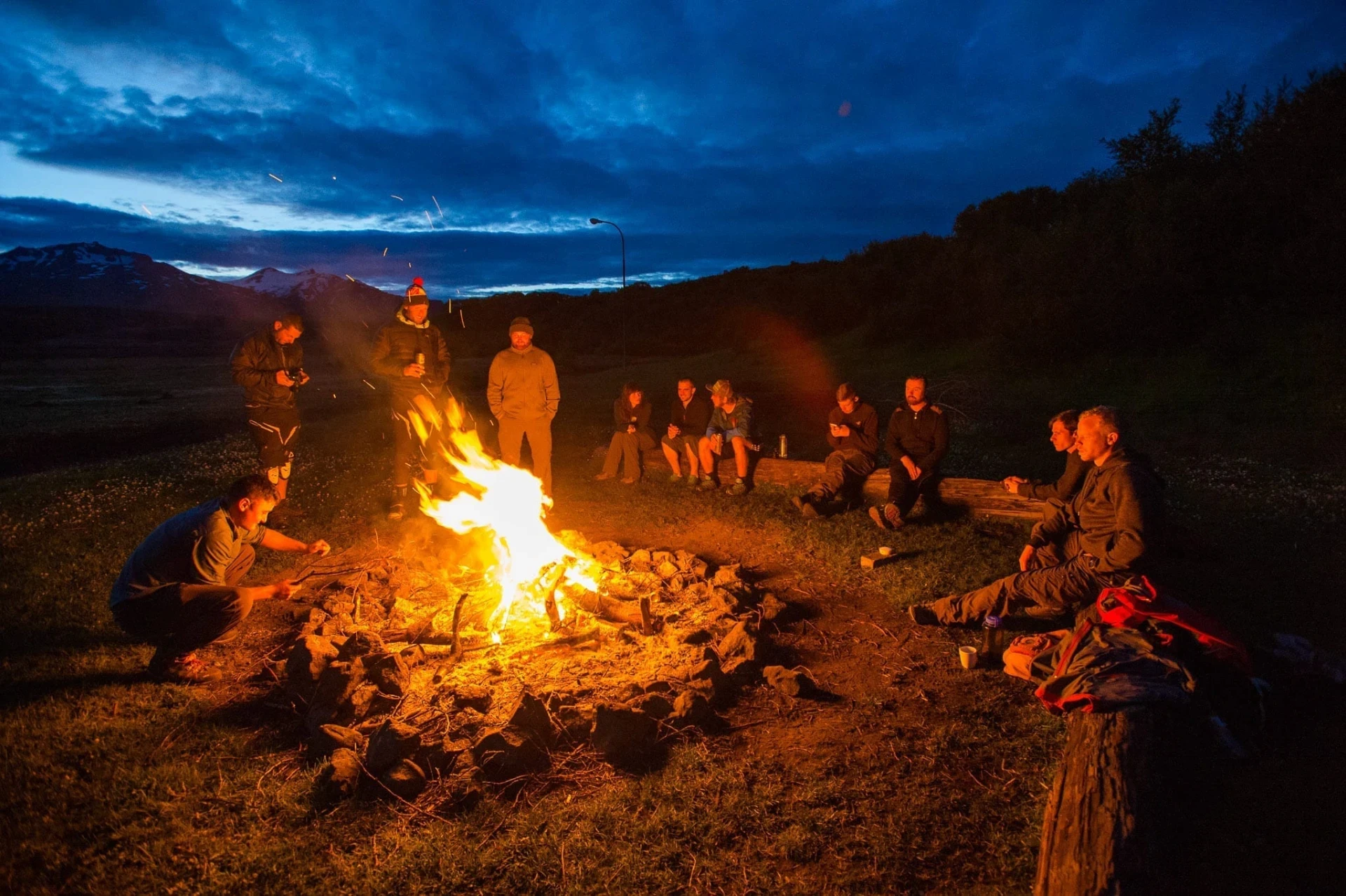 Icebike crew around fire outside