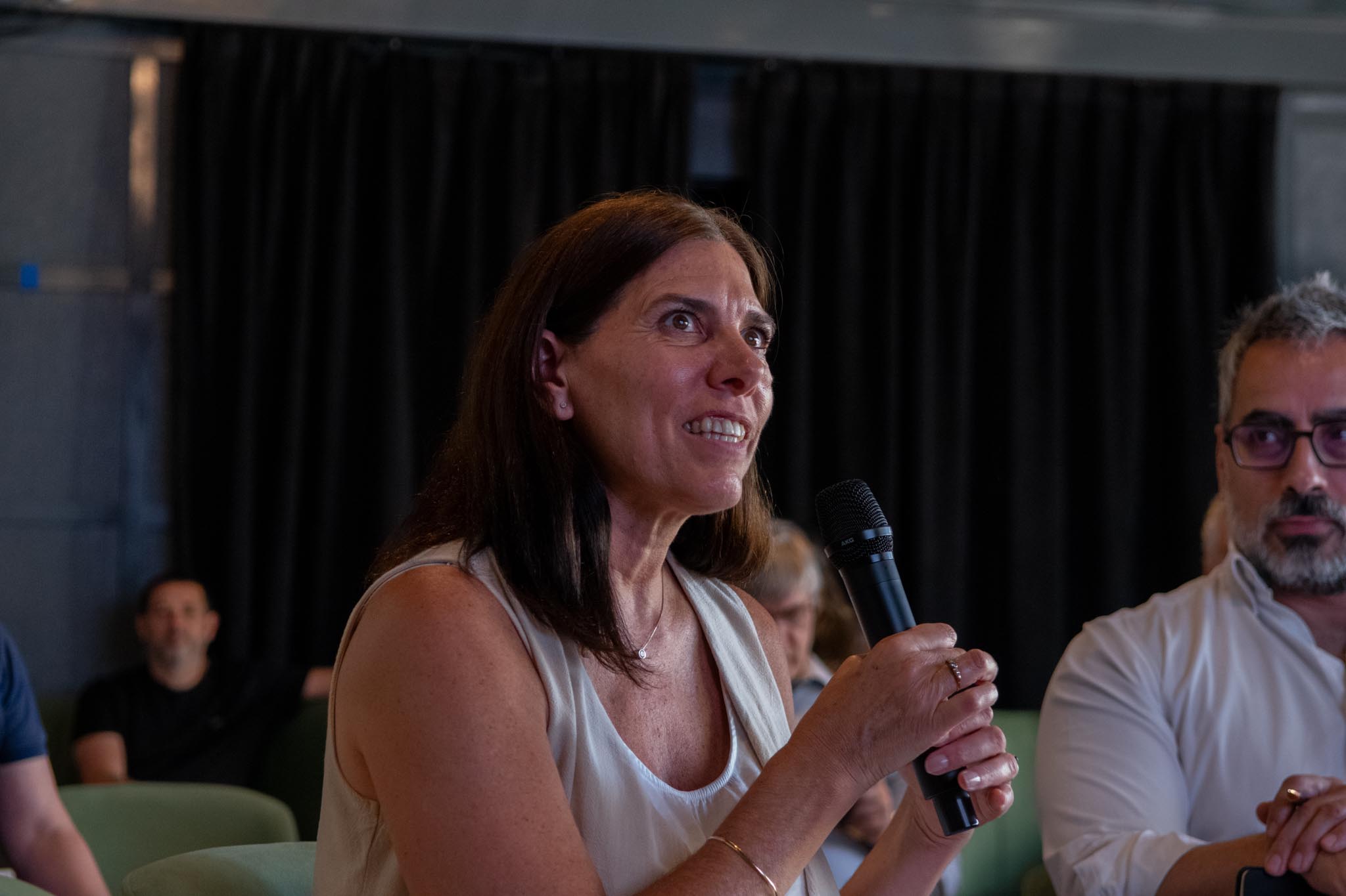 People Sitting Watching In The Theater