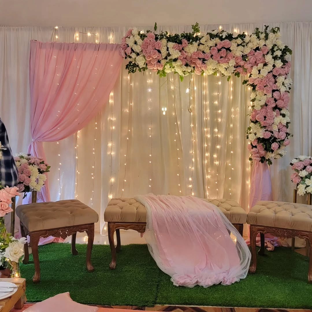 Pastel pink & white flower backdrop for Roka or Engagement home decoration by Decori, Best Engagament Decorator in Delhi NCR.