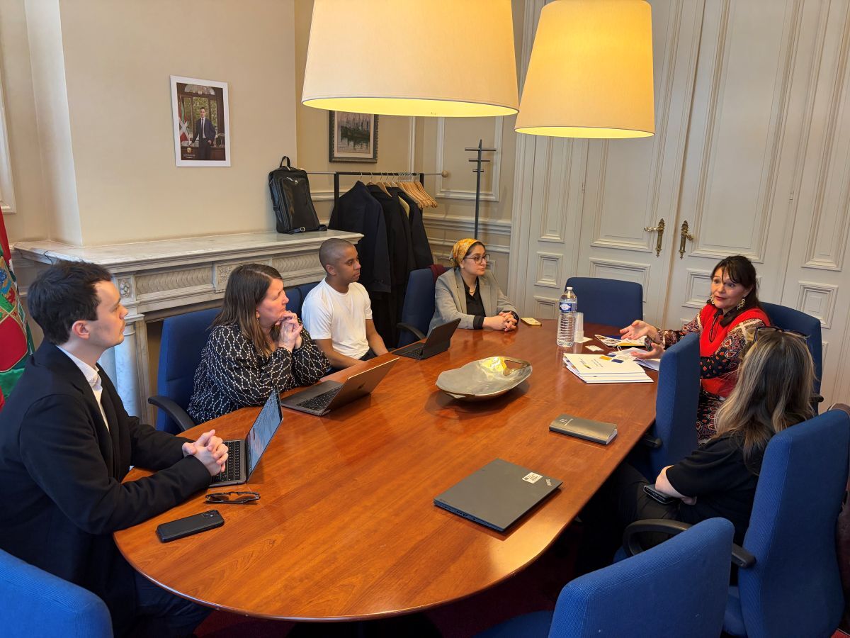 Two business partners shaking hands in agreement.