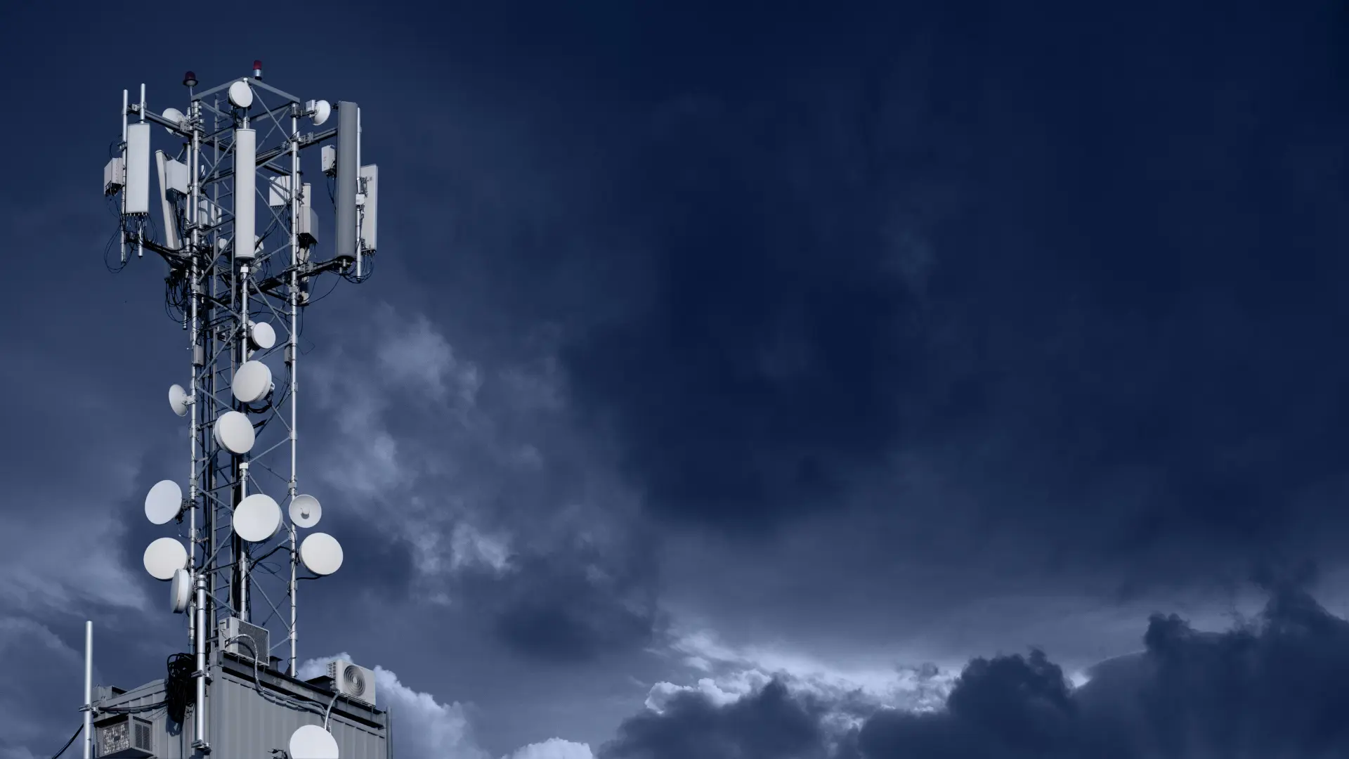 a dark sky with a 5G cell tower 