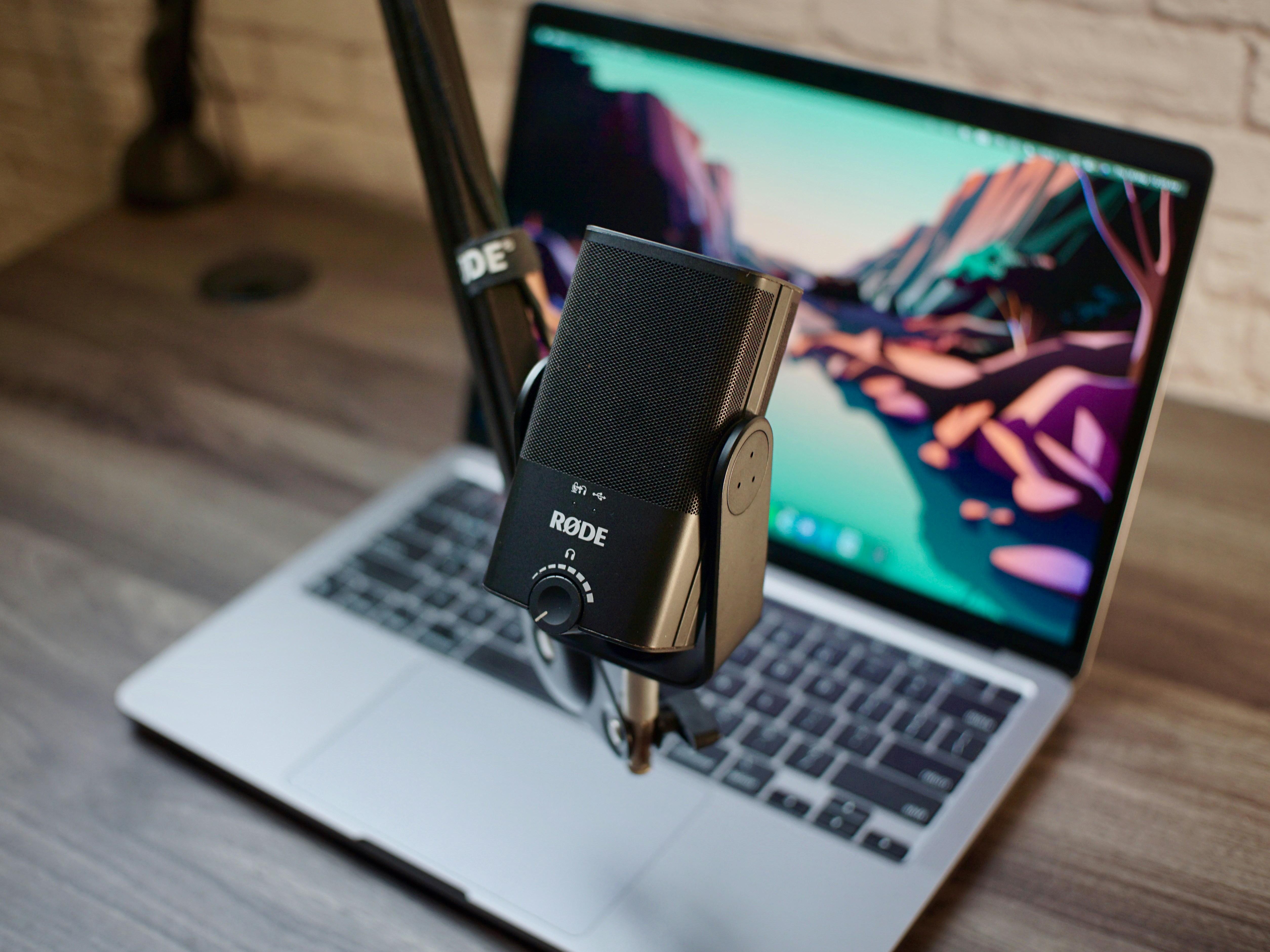 mic infront of laptop for celebrity voice ai generator