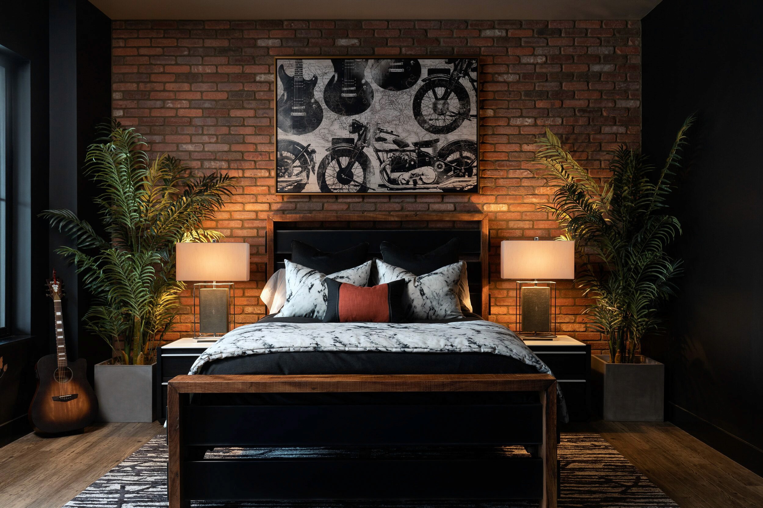 Bed with motorcycle art and guitars
