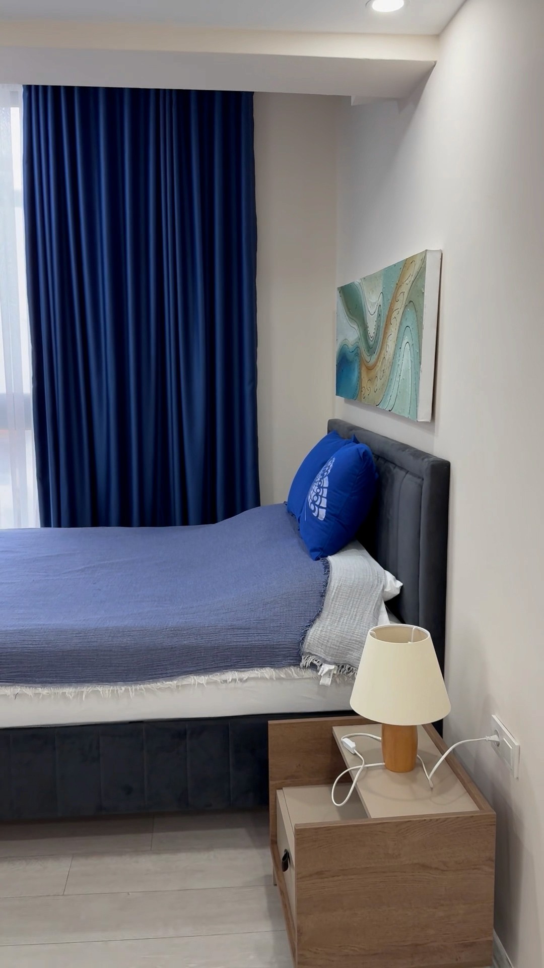 Living area and kitchen in duplex 1 bedroom apartment at Zen Garden Suites Side Antalya