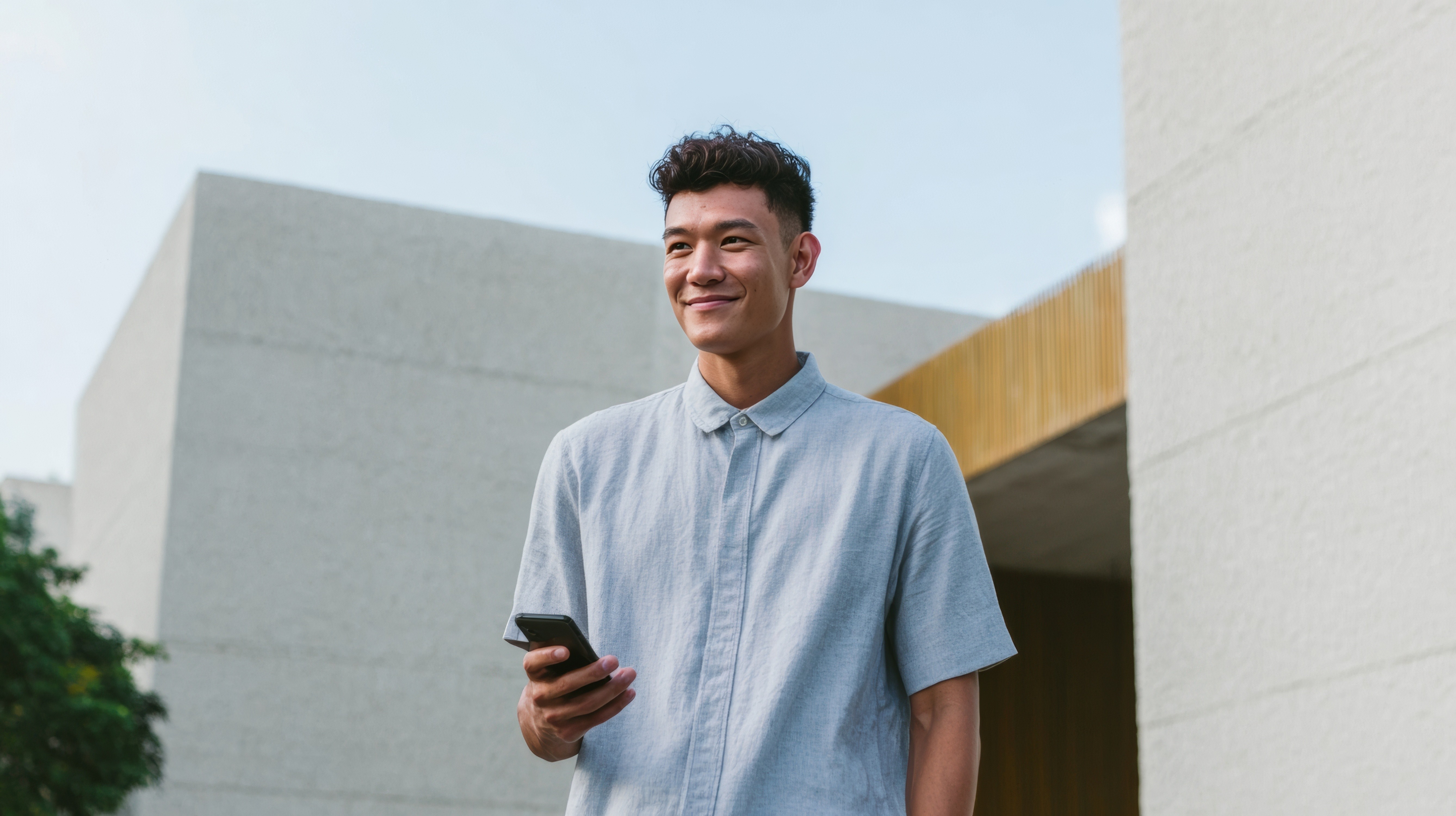 A maroon passport, a credit card, and a document are placed on a dark surface.
