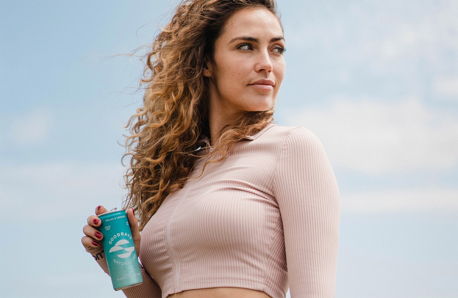 Streetside billboard with flyposters of the Batch.Works brand and illustrations