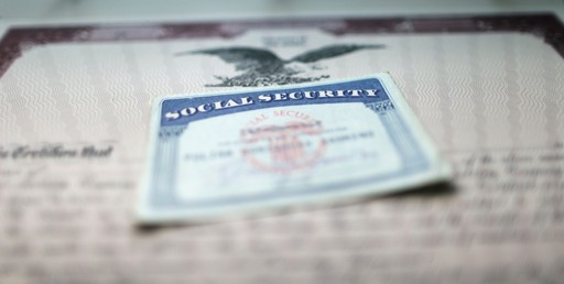 A social security card laying on a table