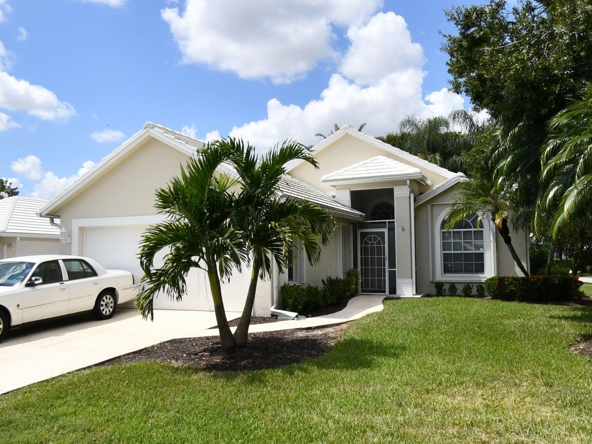 2016 Roof Replacement in Fairway Isles, Saint Lucie West, Port St Lucie with Entegra Flat Tile in Ultra White