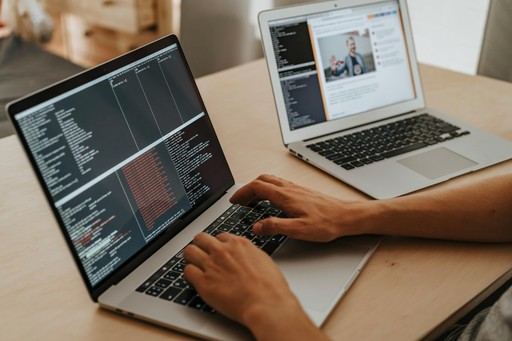 group of people with laptops