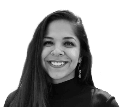 Woman smiling in the camera at a park
