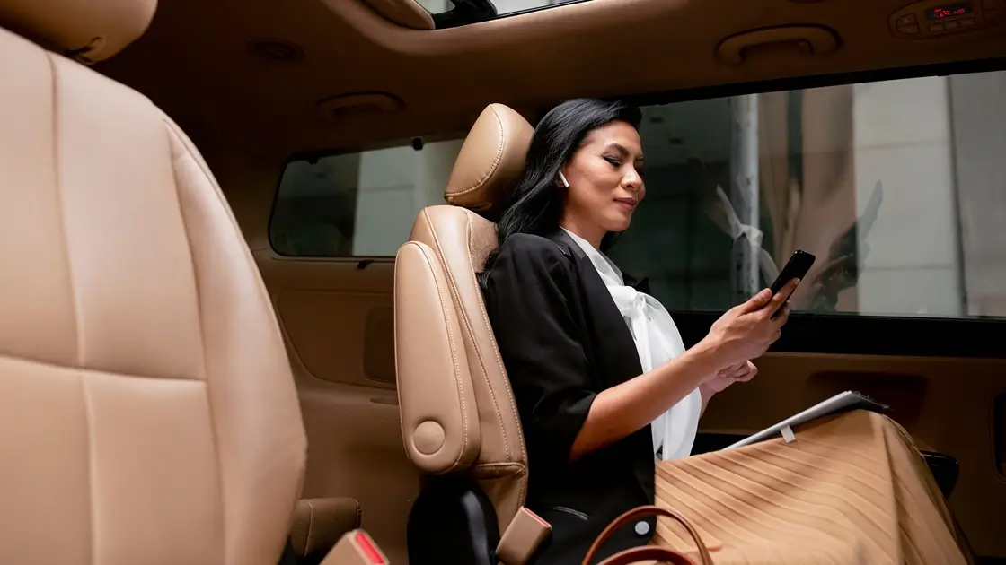 Women sitting in a backseat of the car