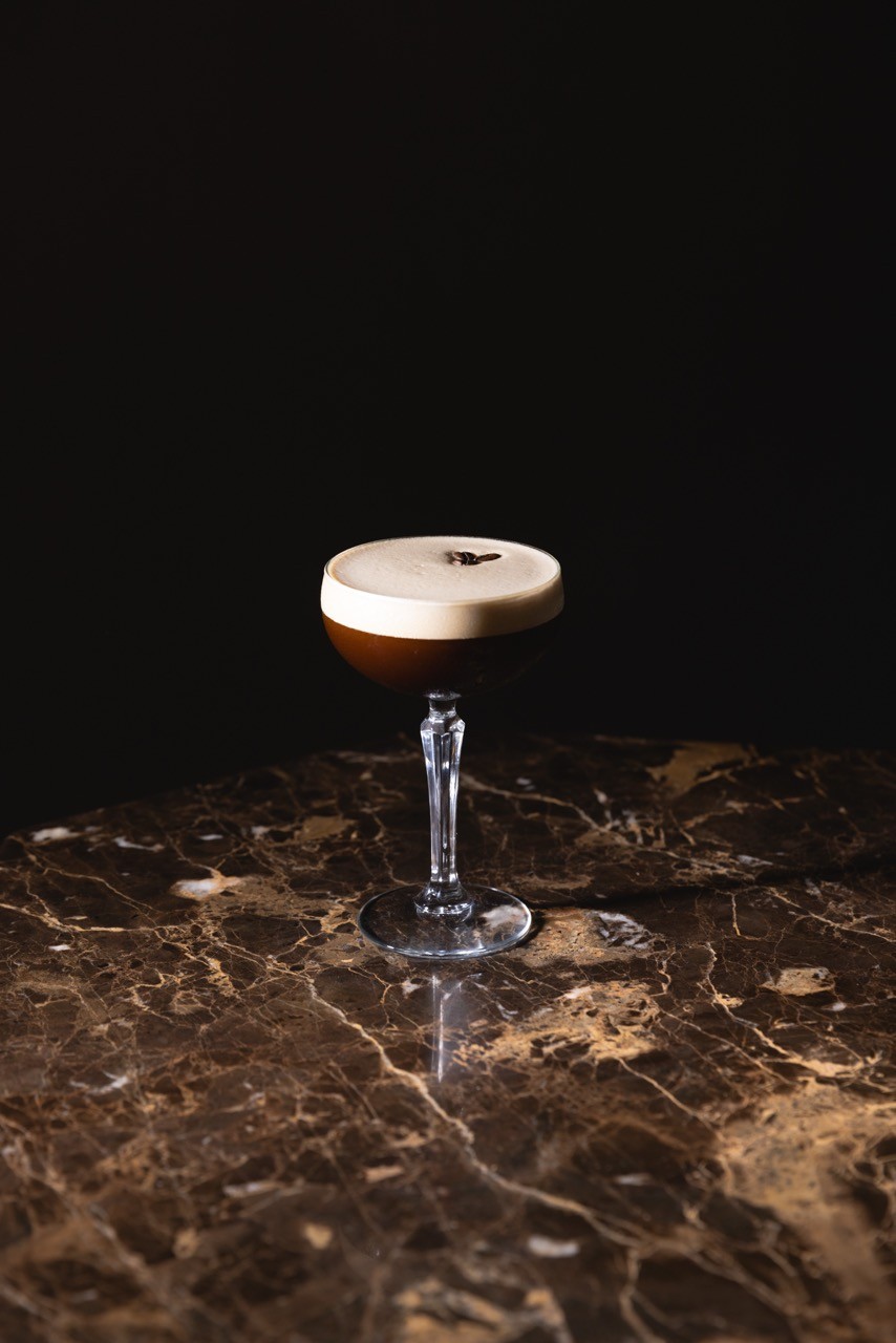 white plastic bottle on white table