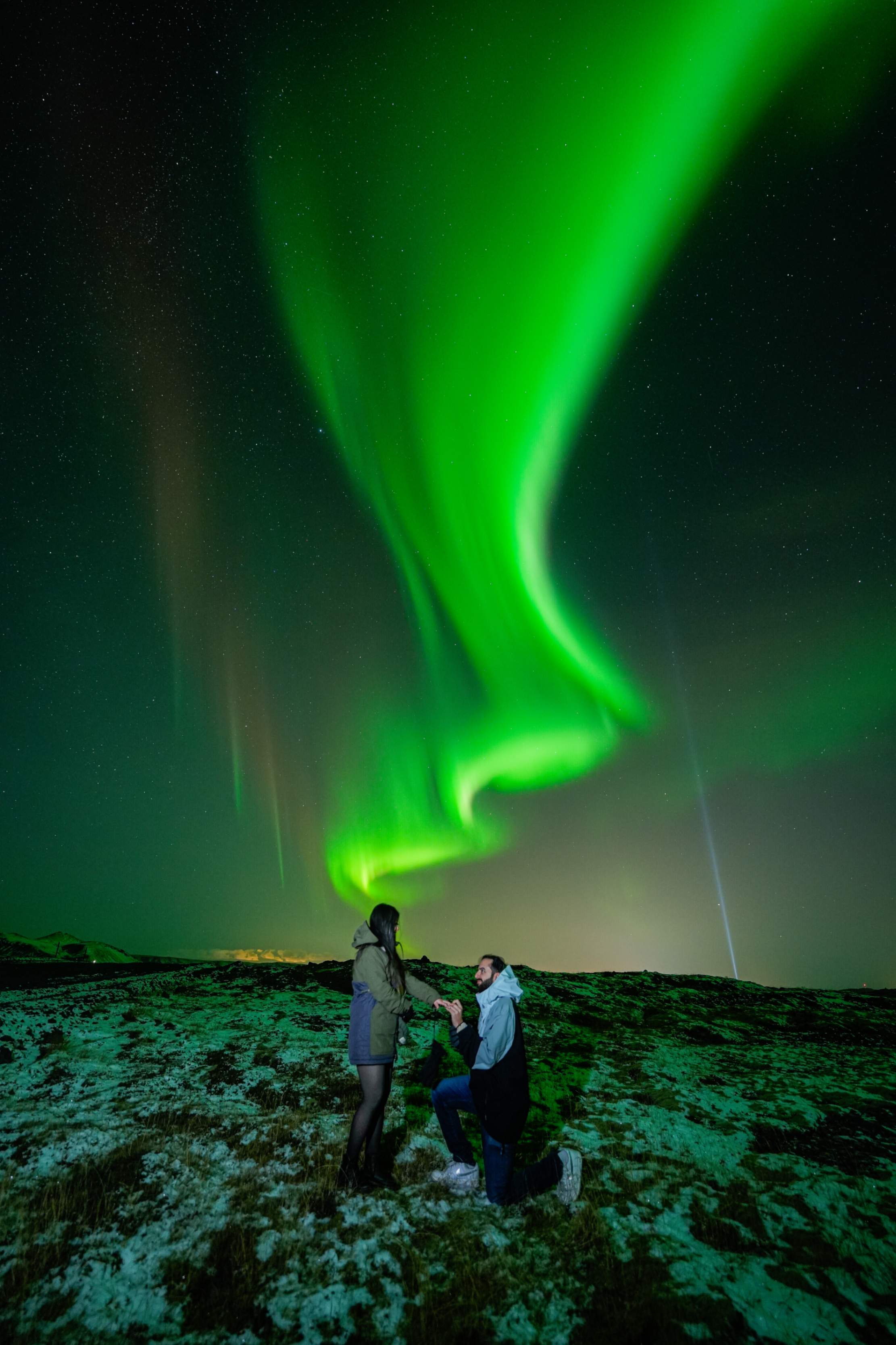 Northern Lights tour photography from Aurora Experts in Iceland, featuring guests beneath the aurora, winter landscapes, and vivid skies over remote Icelandic locations.