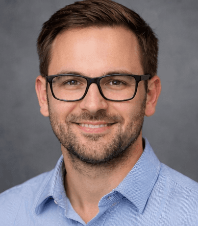 Green vinyl record playing on a turntable.