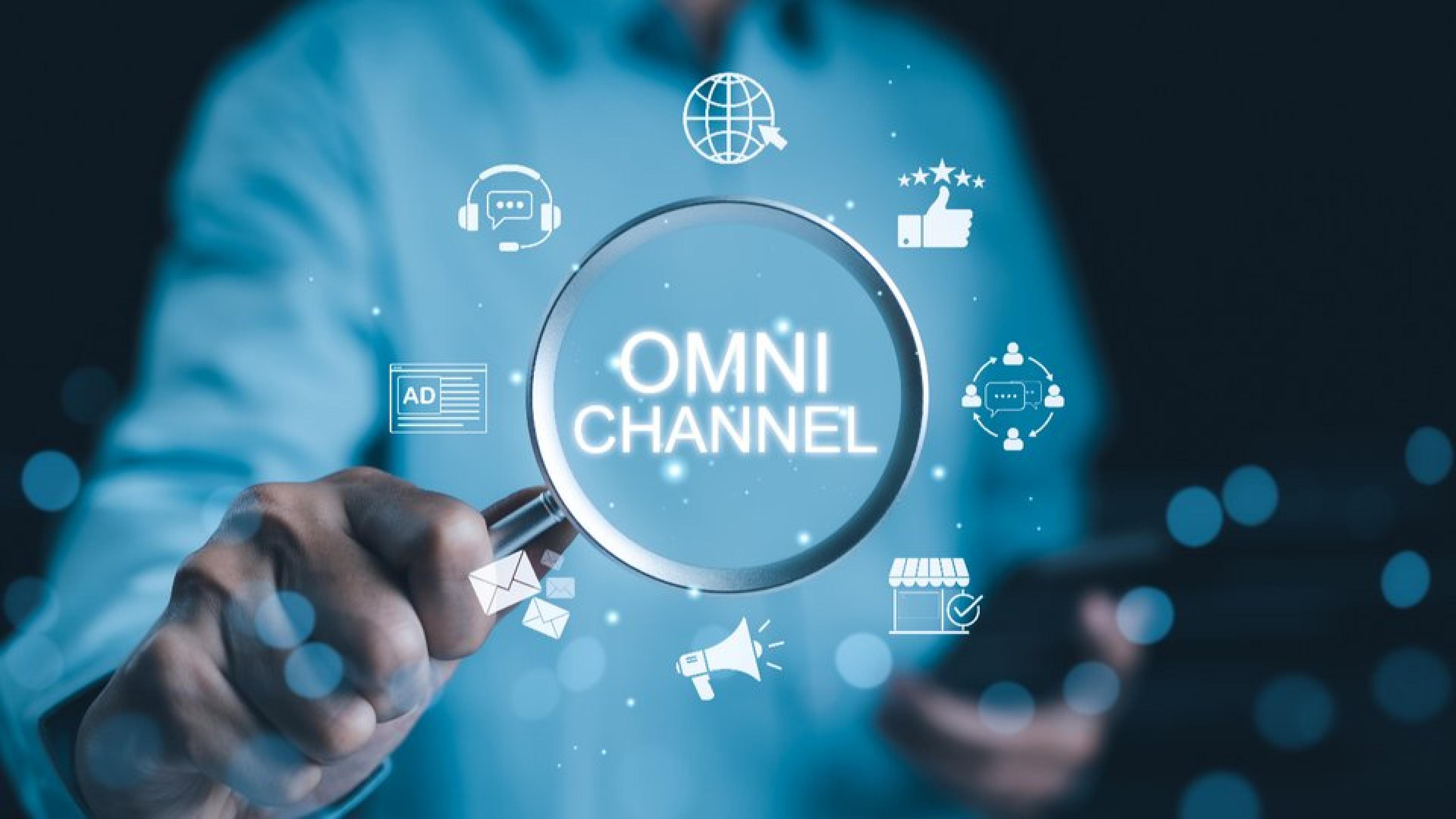Omnichannel retail concept shown through digital icons and magnifying glass