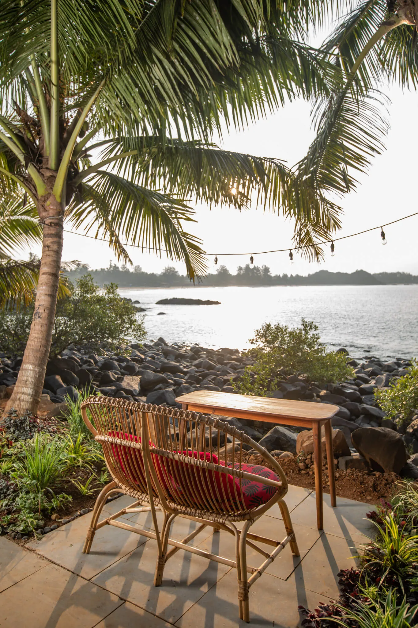 A sunset seat for two above the rocks at Casa Jaali