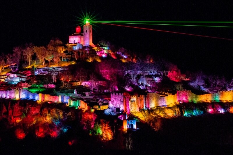 Group of men standing with Sufboard
