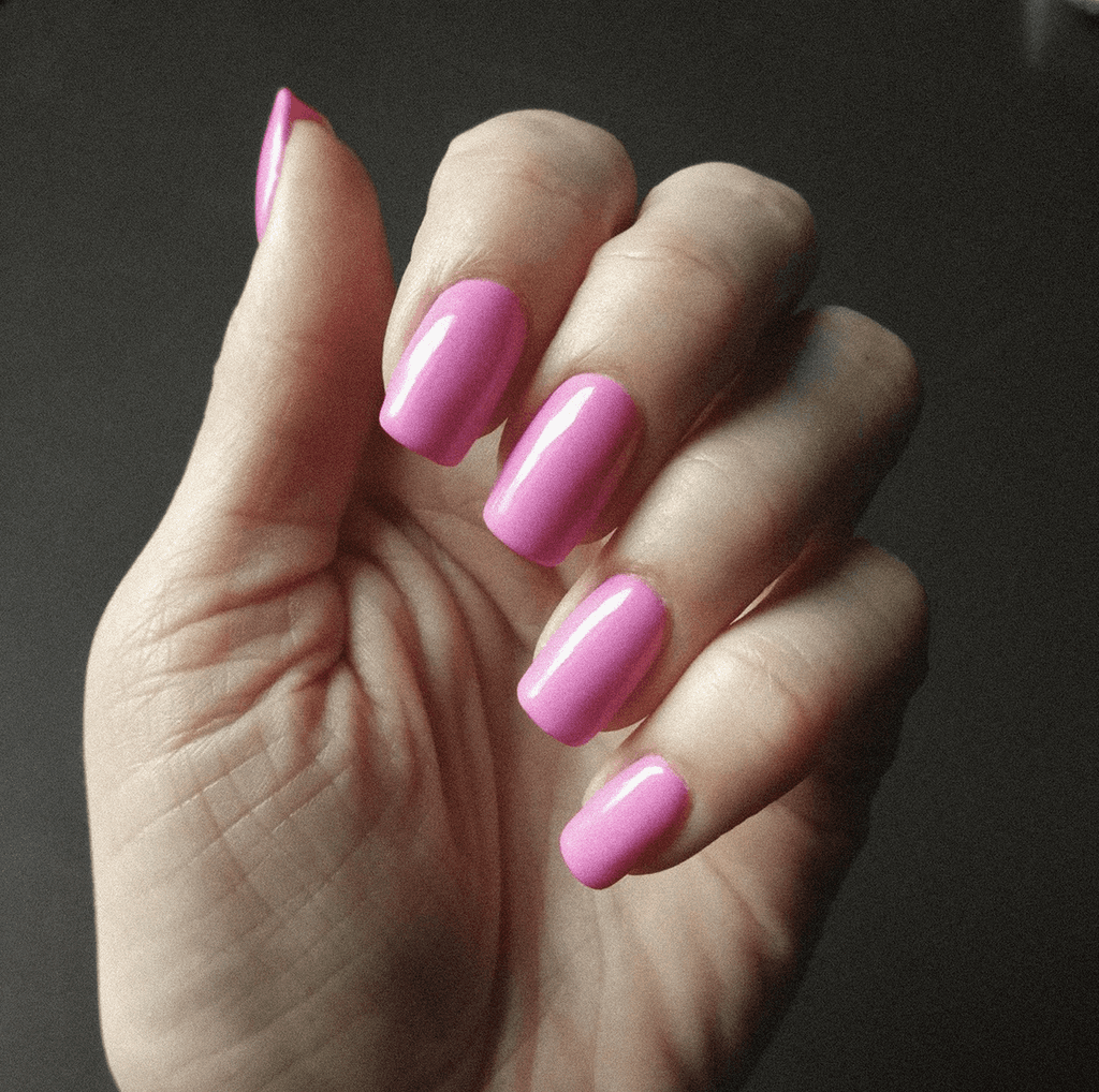 Woman selecting nail polish samples