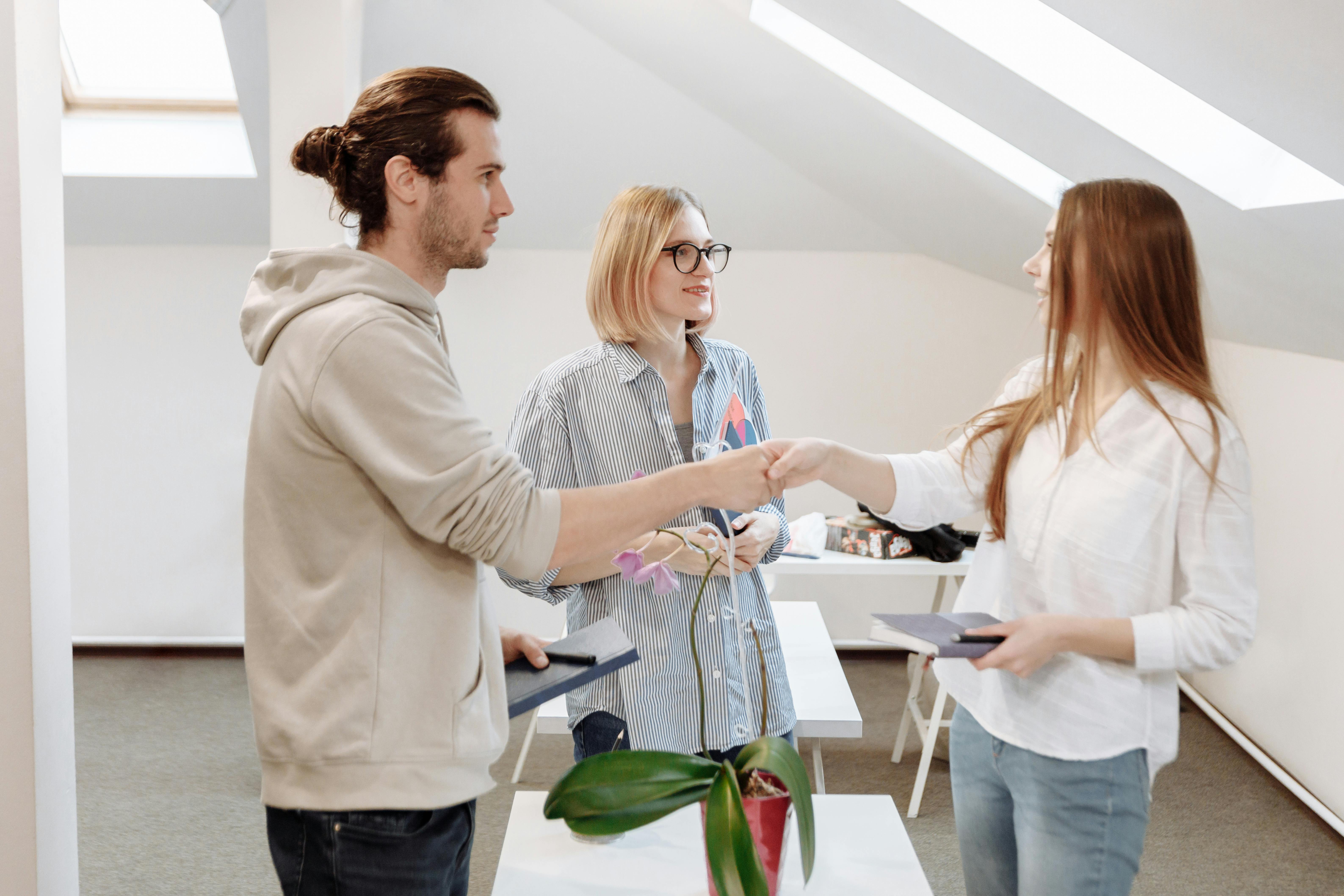 Man shaking hands with a loan officer