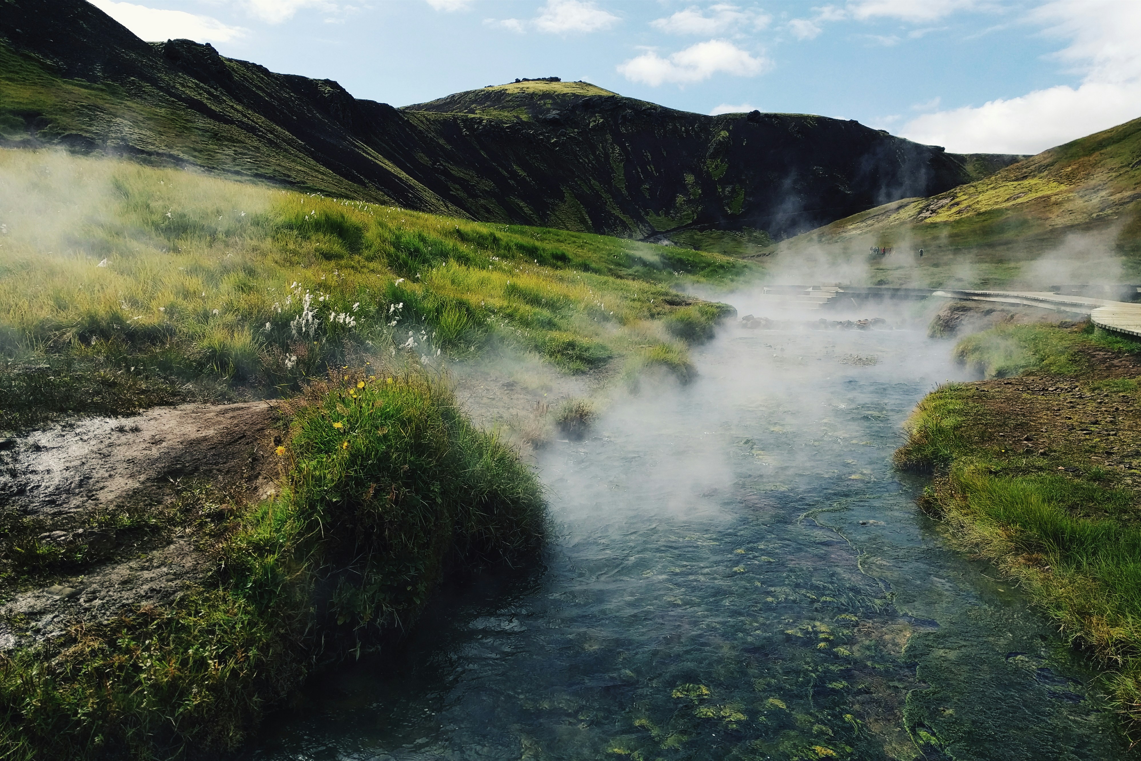 Steam rising from the Reykjadalur Hot Spring River in South Iceland.
